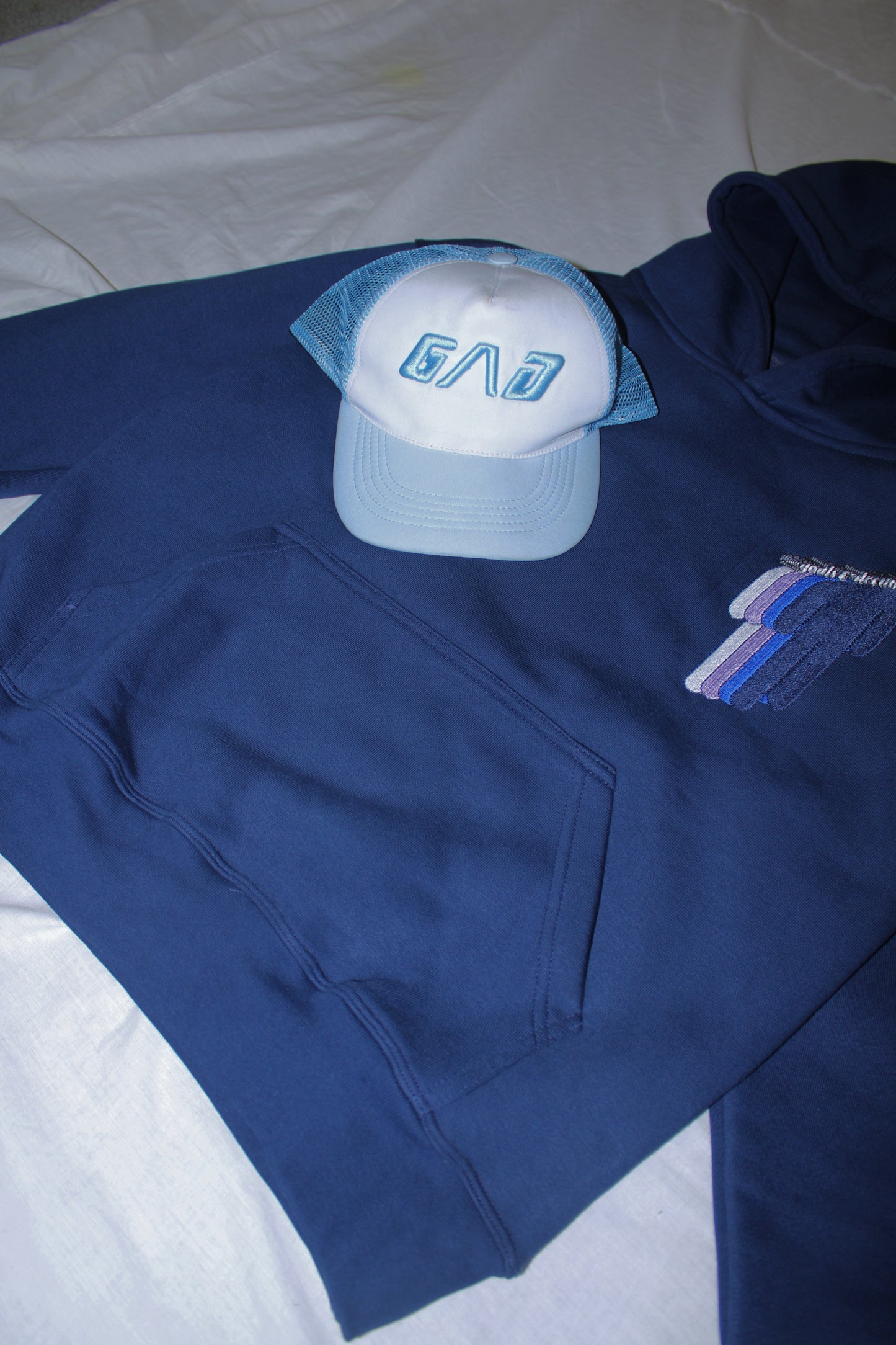 GAD logo trucker cap sky blue